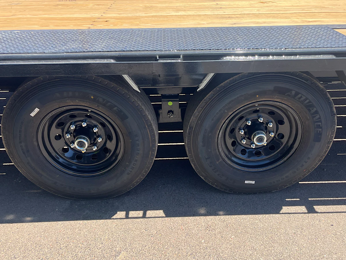 P.J. Trailers 32' Gooseneck Low-Pro Flatdeck with Singles, 15,680 GVWR, Monster Ramps, 14 Ply Tires - Stock #PPJ11219 - Image 3 of 7 P.J. Trailers 32' Gooseneck Low-Pro Flatdeck with Singles, 15,680 GVWR, Monster Ramps, 14 Ply Tires - Stock #PPJ11219 - Image 3 of 7