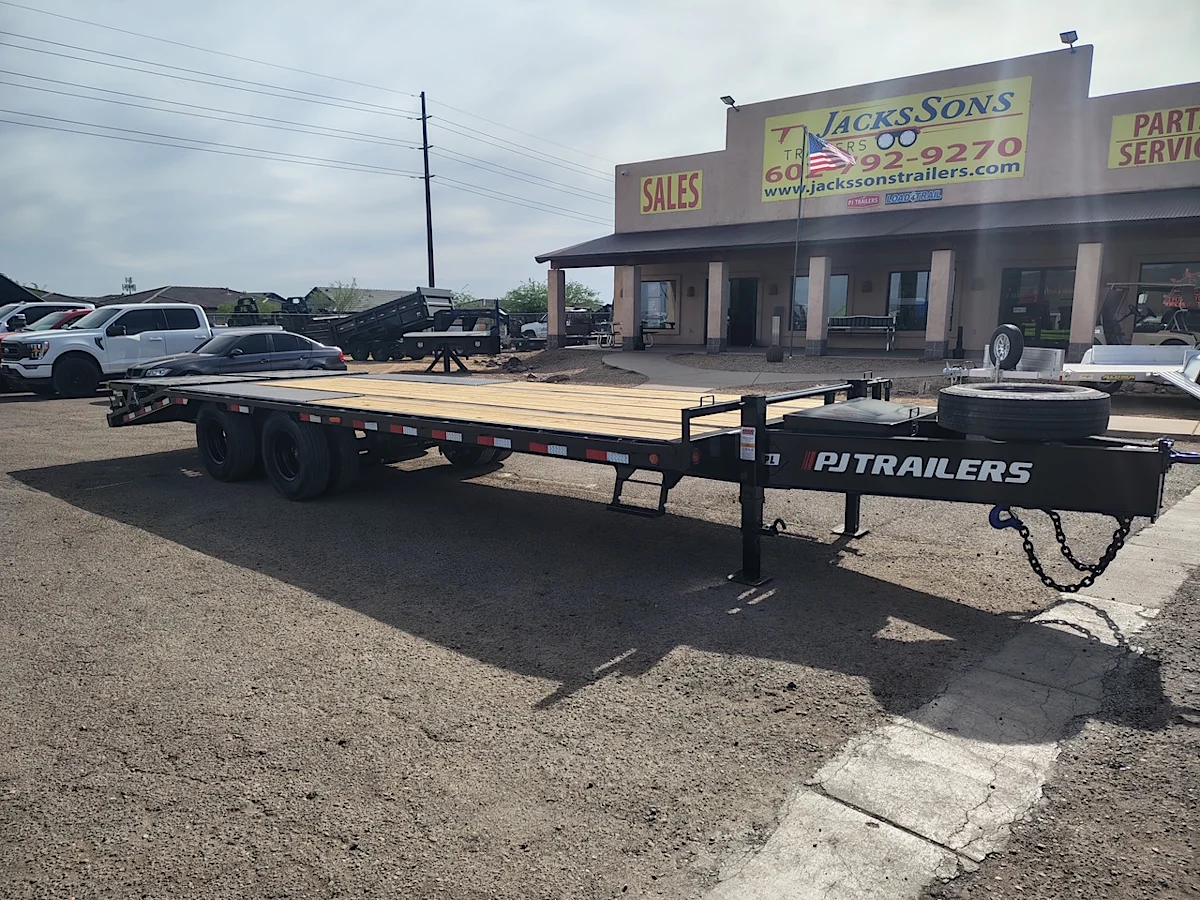 P.J. Trailers 25x102 Tandem Axle 25,900 GVWR Low-Pro Deckover with Duals, Monster Ramps, 14 Ply Tires - Stock #PPJ11180 - Image 1 of 12 P.J. Trailers 25x102 Tandem Axle 25,900 GVWR Low-Pro Deckover with Duals, Monster Ramps, 14 Ply Tires - Stock #PPJ11180 - Image 1 of 12