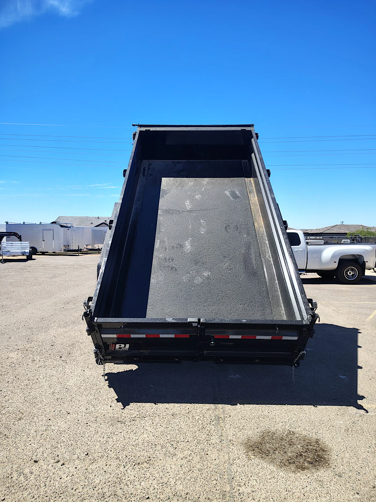 PJ Trailers 14x83 Tandem Axle, 15,400 GVWR, Low Pro Dump, 24" Sides, Solar Charger, 14 Ply Tires - Stock #PJD1701 - Image 4 of 11 PJ Trailers 14x83 Tandem Axle, 15,400 GVWR, Low Pro Dump, 24" Sides, Solar Charger, 14 Ply Tires - Stock #PJD1701 - Image 4 of 11