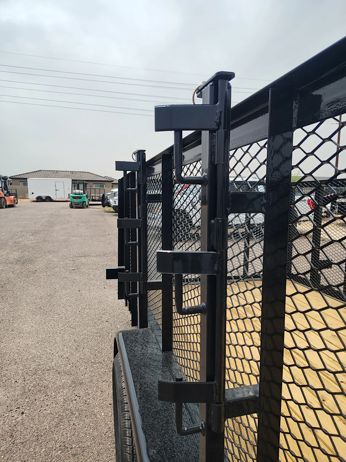 Texas Bragg 20x83 Tandem Axle, Landscape, 7K GVWR, 4' Expanded Metal Sides - Stock #TXB018 - Image 1 of 6 Texas Bragg 20x83 Tandem Axle, Landscape, 7K GVWR, 4' Expanded Metal Sides - Stock #TXB018 - Image 1 of 6