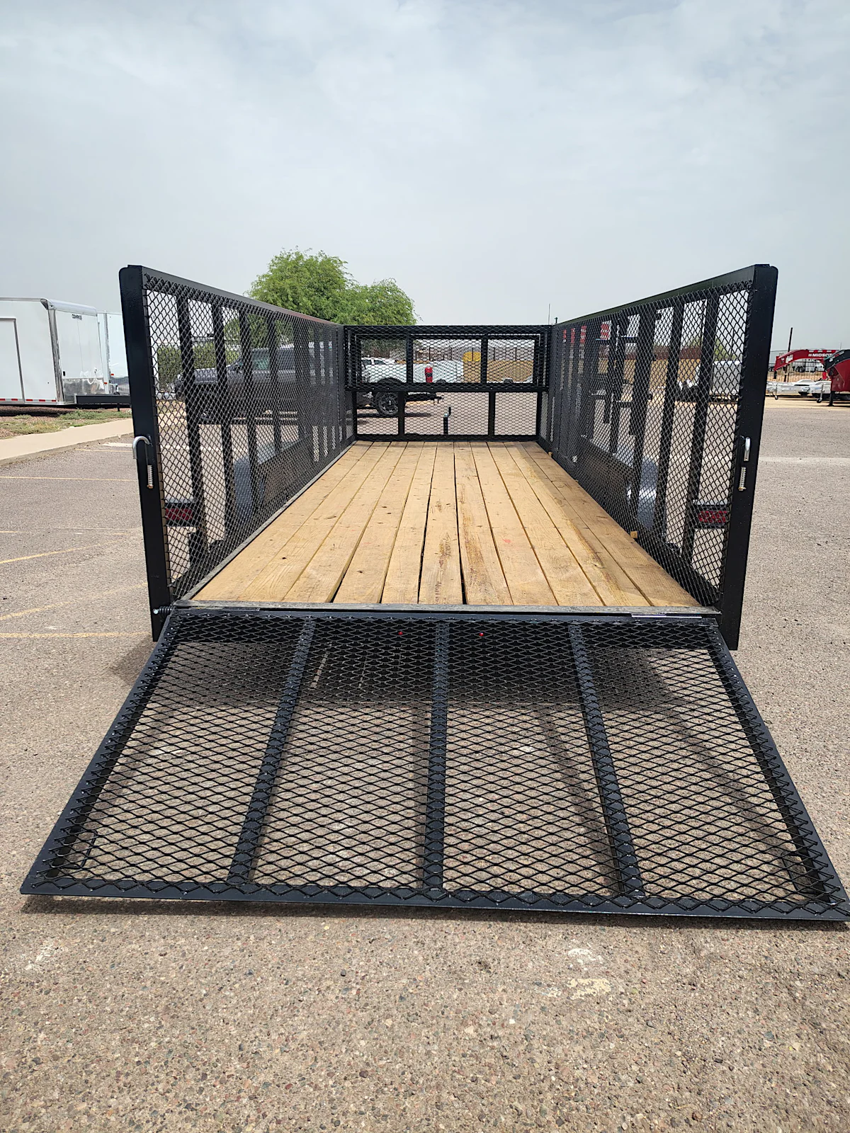 Texas Bragg 20x83 Tandem Axle, Landscape, 7K GVWR, 4' Expanded Metal Sides - Stock #TXB019 - Image 1 of 6 Texas Bragg 20x83 Tandem Axle, Landscape, 7K GVWR, 4' Expanded Metal Sides - Stock #TXB019 - Image 1 of 6