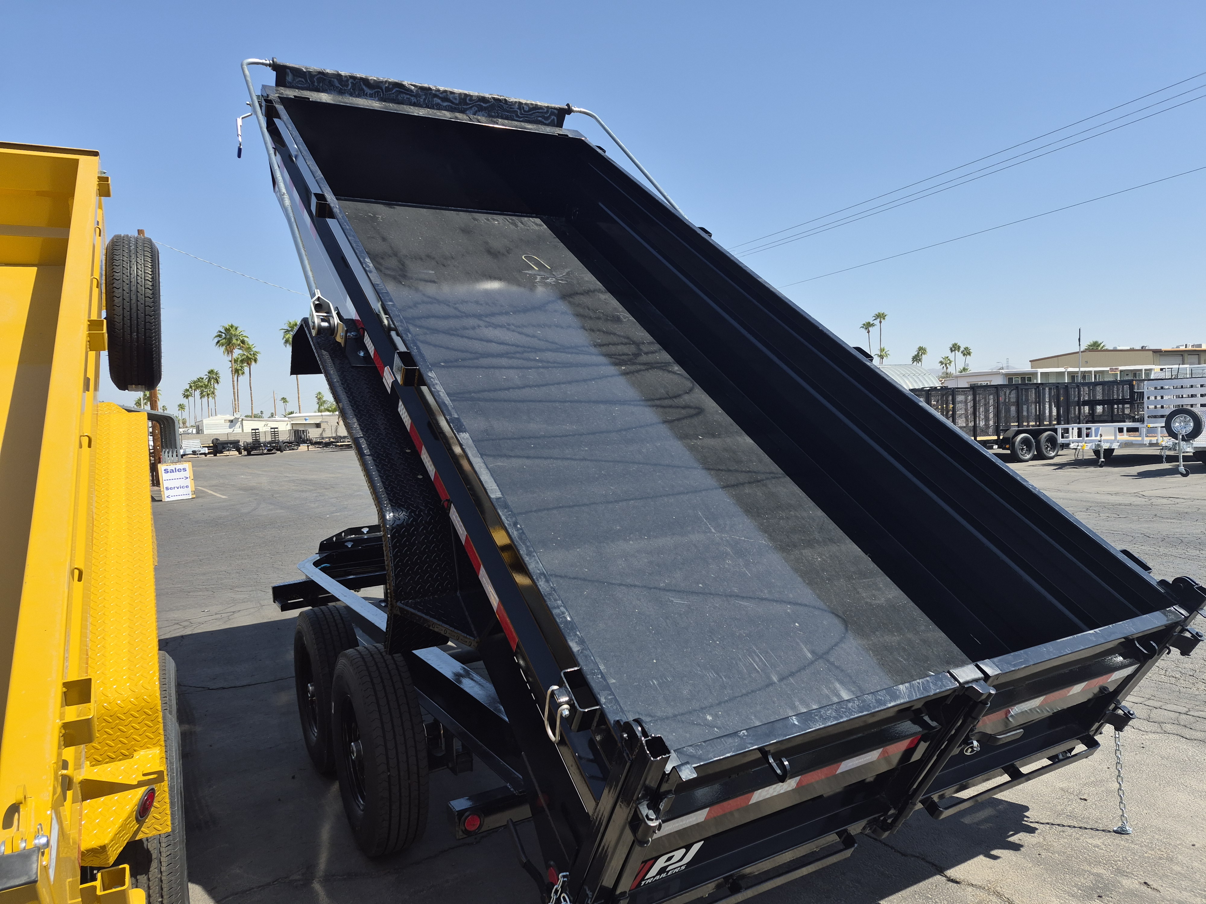P.J. Trailers 16x83 Tandem Axle, 15,400 GVWR, Low Pro Dump, 24" Sides, 14 Ply Tires - Stock #PJD1660 - Image 4 of 4