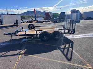P.J. Trailers 14x83 Tandem Axle, 7K GVWR, Channel Utility, DT w/ 3' Gate