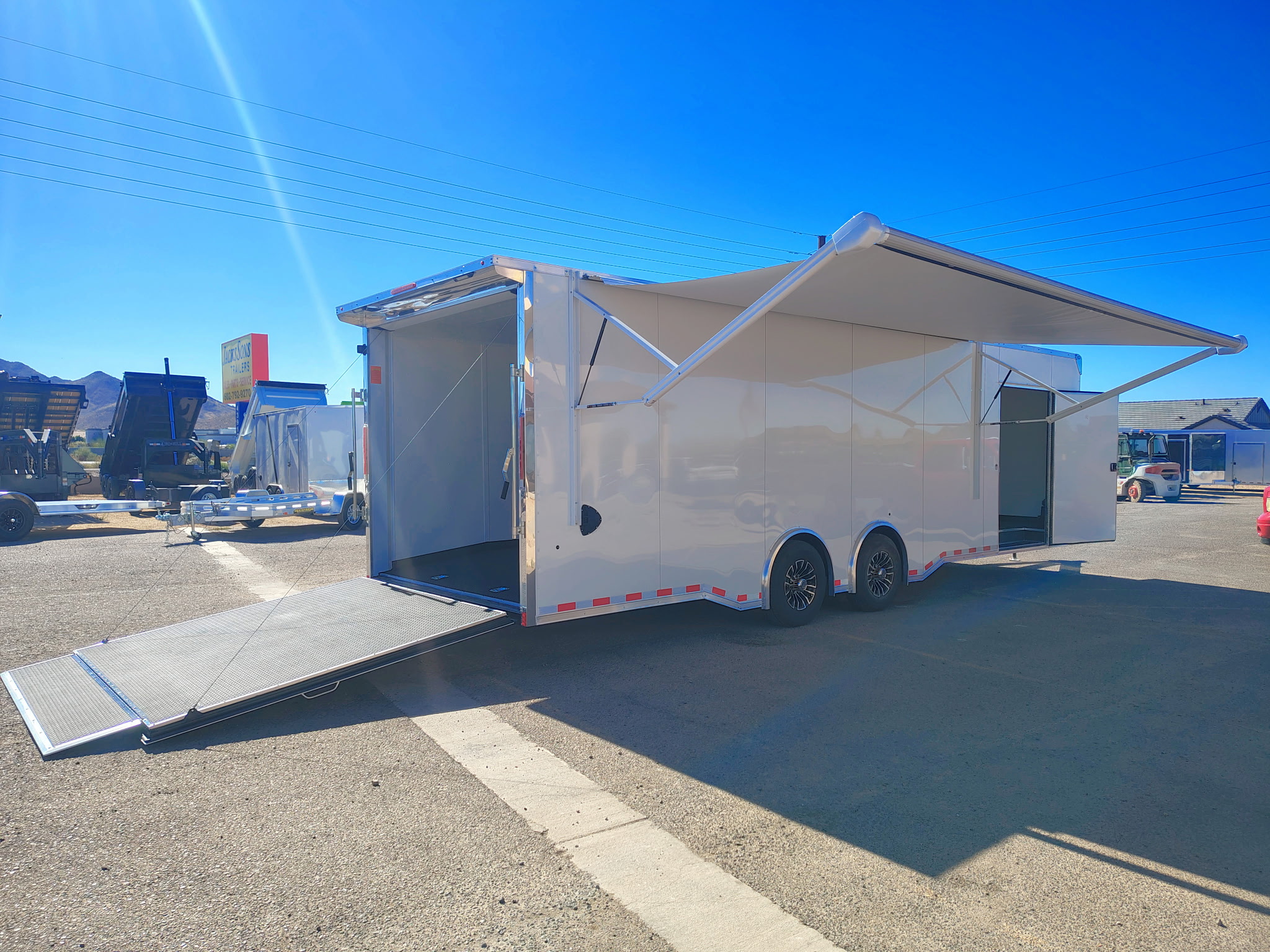 Compass 28x8.5 Canyon Race Trailer, 14K GVWR, Ramp Door,  AC/Heat, Elec. Awning - Stock #CMP2879 - Image 4 of 14