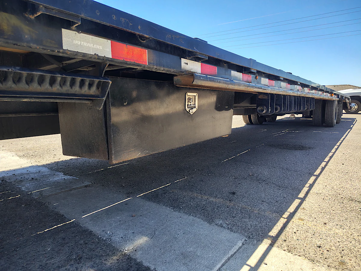 P.J. Trailers 40' Low-Pro Flatdeck w/ Duals, Air Ride, Elec/Hyd Disc brakes, 25K GVWR - Stock #USD8810 - Image 10 of 11 P.J. Trailers 40' Low-Pro Flatdeck w/ Duals, Air Ride, Elec/Hyd Disc brakes, 25K GVWR - Stock #USD8810 - Image 10 of 11