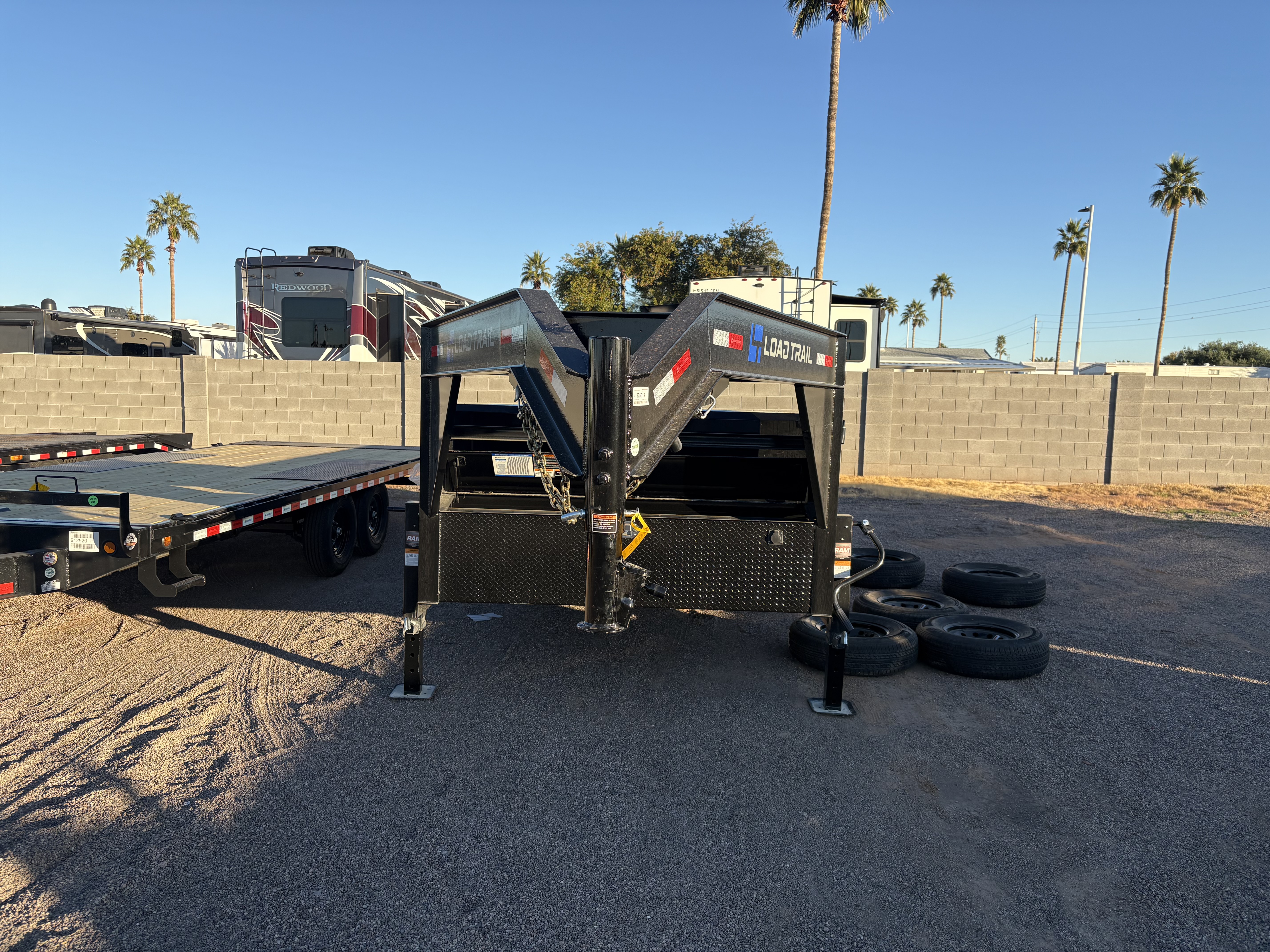 Load Trail 16x83 Gooseneck, Tandem Axle, 14 GVWR, Low-Pro Dump, 24" Sides - Stock #LTD917 - Image 1 of 5