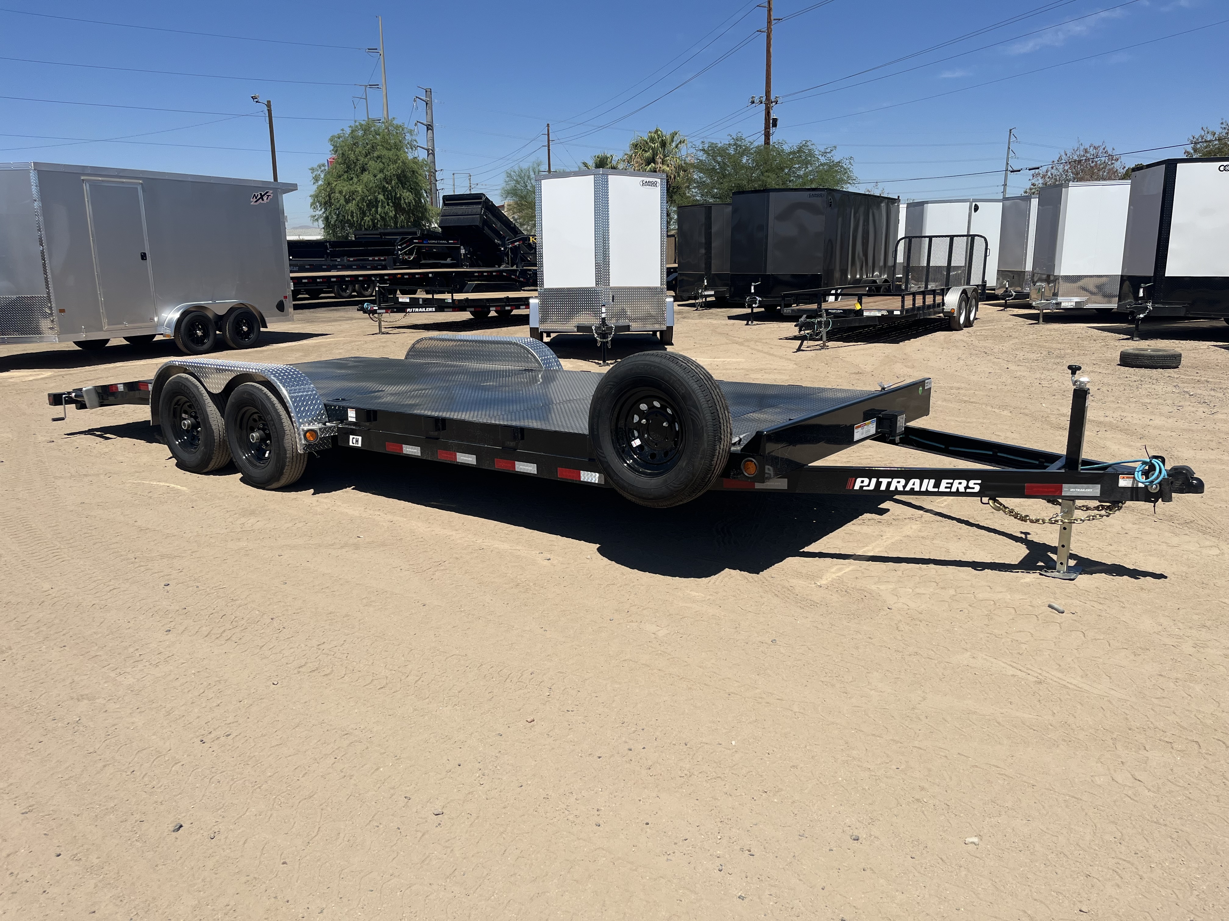 P.J. Trailers 22x83 Tandem Axle, 10K GVWR, Steel Deck Car Hauler, Slide-In Ramps - Stock #PPJ11218 - Image 1 of 9