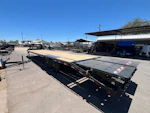 PJ Trailers 36' Gooseneck Low-Pro Flatdeck with Singles, 15,680 GVWR, Monster Ramps, 14 Ply Tires Stock #PPJ11220 - Thumbnail 1