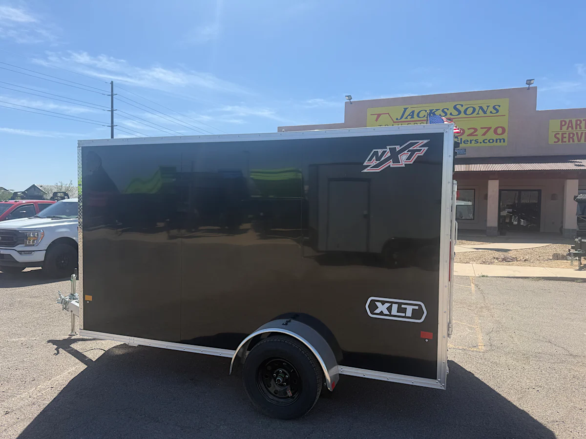 Alcom 12x6 All Aluminum NXT Enclosed, 3K GVWR, Limited Edition, Ramp Door - Stock #ALC223 - Image 1 of 8 Alcom 12x6 All Aluminum NXT Enclosed, 3K GVWR, Limited Edition, Ramp Door - Stock #ALC223 - Image 1 of 8