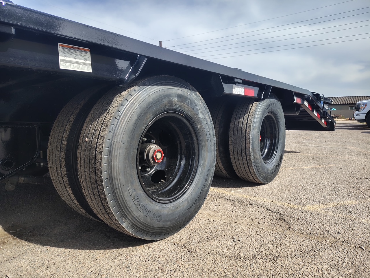 P.J. Trailers 25x102 Tandem Axle 25,900 GVWR Low-Pro Deckover with Duals, Monster Ramps, 14 Ply Tires - Stock #PPJ11178 - Image 3 of 12