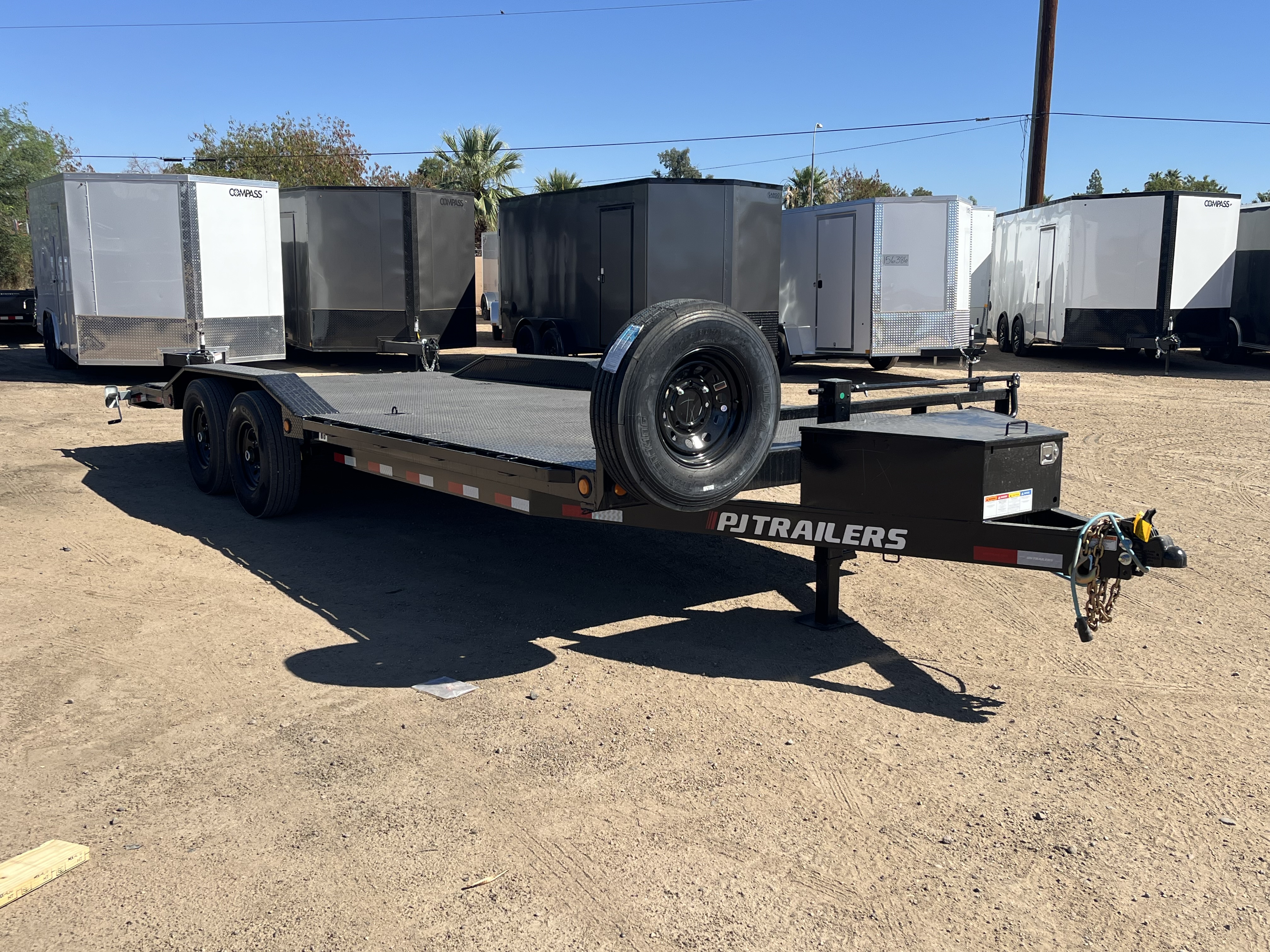 P.J. Trailers 22x102x6" Channel Tandem Axle, 14K GVWR Super-Wide, Equipment, Slide In Ramps - Stock #PPJ11039 - Image 1 of 10