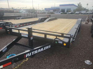 P.J. Trailers 22x102x6" Channel Tandem Axle 14K GVWR Super-Wide Equipment, Slide In Ramps