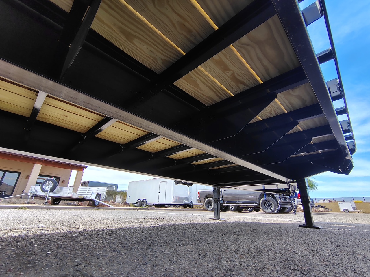 P.J. Trailers 25x102 Tandem Axle 25,900 GVWR Low-Pro Deckover with Duals, Monster Ramps, 14 Ply Tires - Stock #PPJ11178 - Image 9 of 12