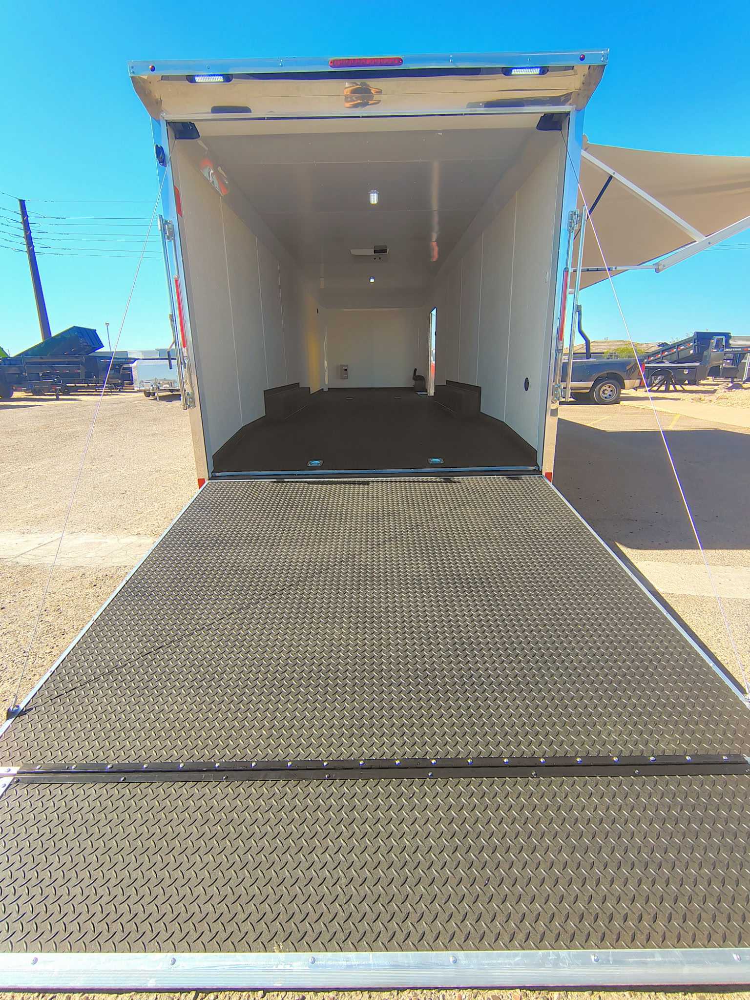 Compass 28x8.5 Canyon Race Trailer, 14K GVWR, Ramp Door,  AC/Heat, Elec. Awning - Stock #CMP2879 - Image 13 of 14