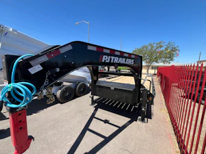 P.J. Trailers 32' Gooseneck Low-Pro Flatdeck with Singles, 15,680 GVWR, Monster Ramps, 14 Ply Tires