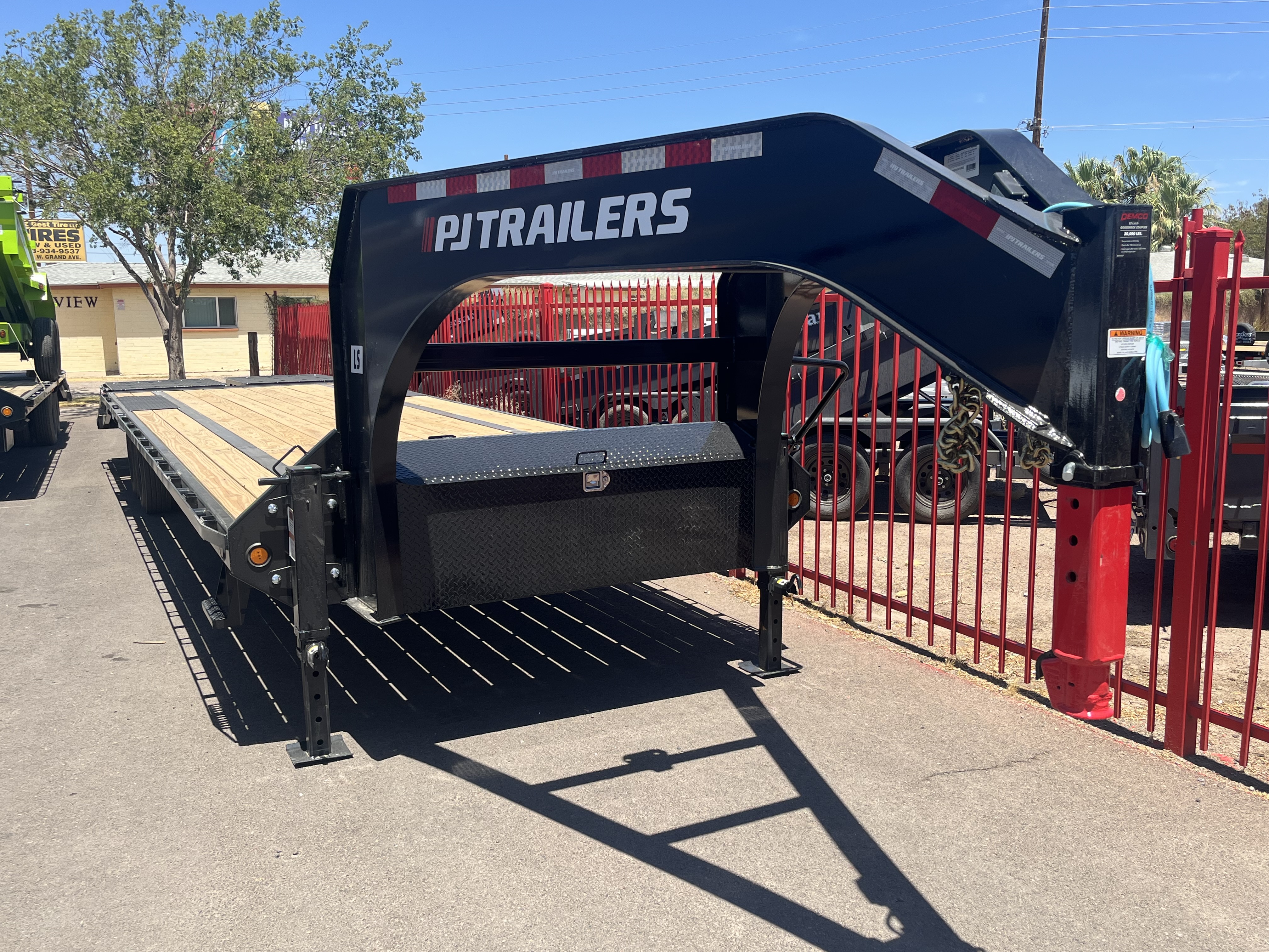 P.J. Trailers 32' Gooseneck Low-Pro Flatdeck with Singles, 15,680 GVWR, Monster Ramps, 14 Ply Tires - Stock #PPJ11219 - Image 6 of 7