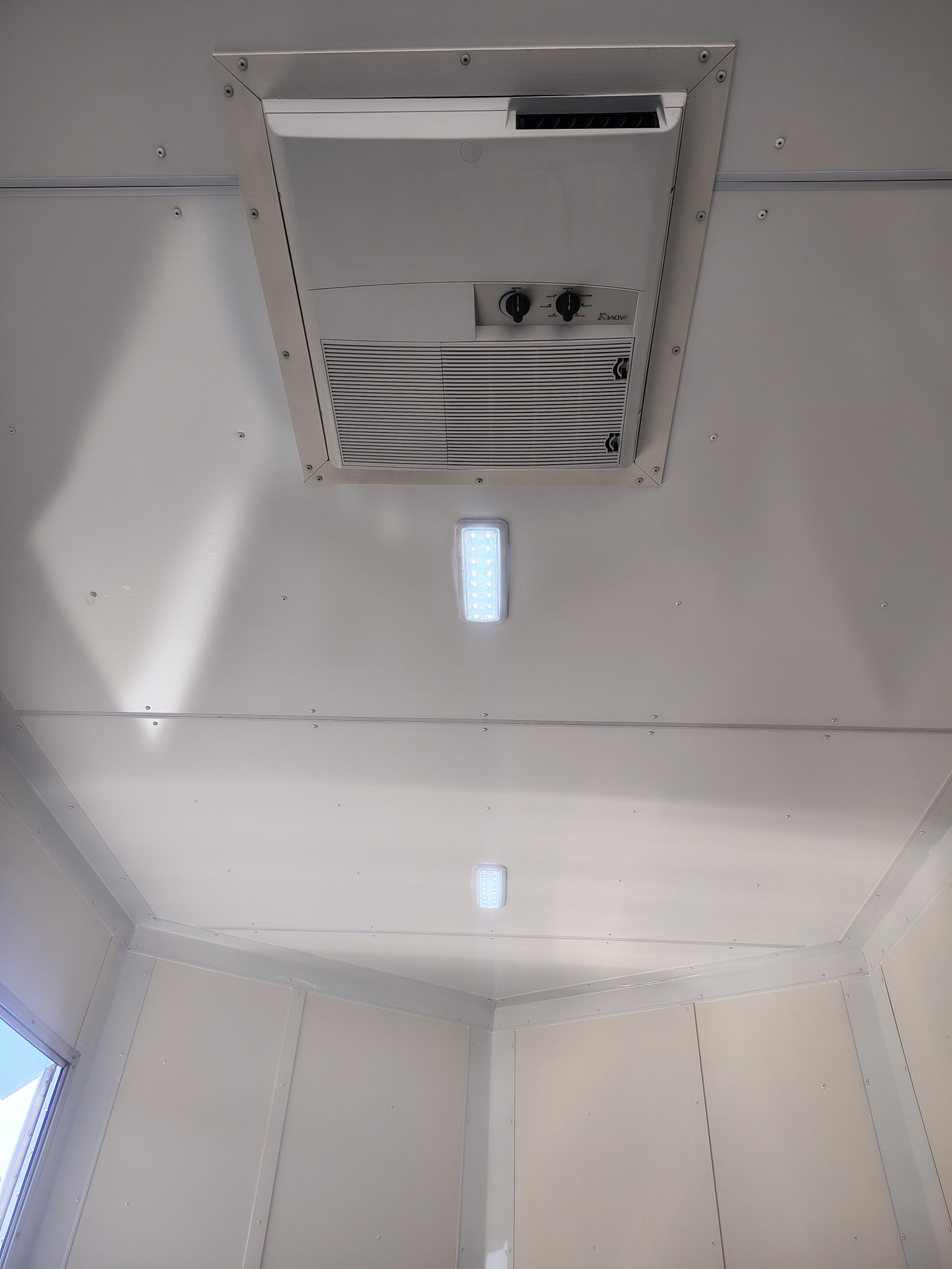Pace American 16x8.5 Journey SE Flat Top Sloped V-Nose Car Hauler, 7K GVWR, Slider Window, AC/Heat, Jacknife Sofa, Insulated Walls/Ceiling, Drive Over Wheel Boxes, Rubber Flooring, Power Awning - Stock #CMP2880 - Image 11 of 16
